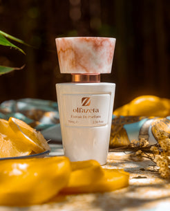 Flacon blanc Olfazeta by Chogan Millésime N°145 avec quartiers d'agrumes et fleurs séchées, ambiance ensoleillée